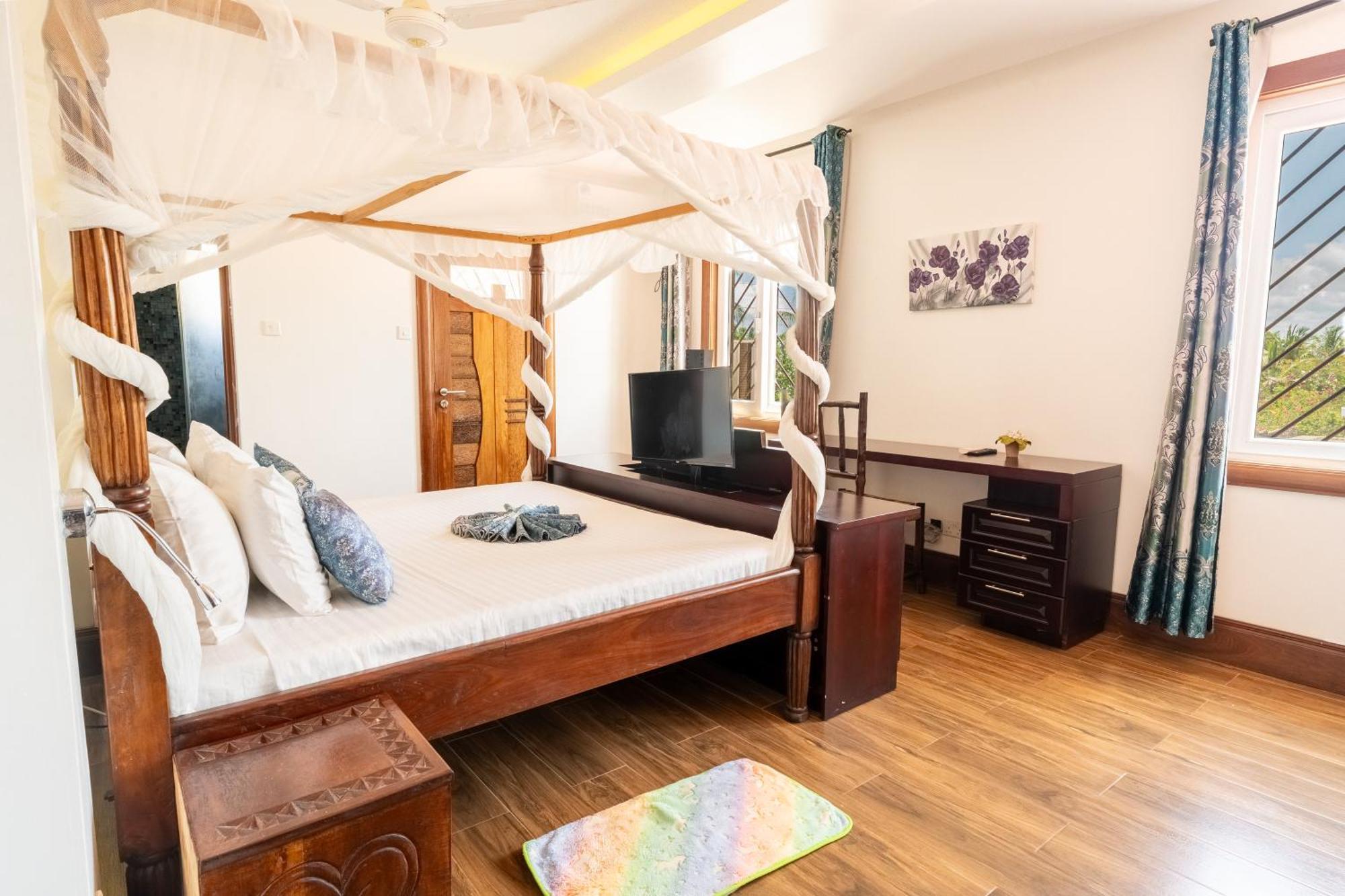 Queens Chateau Boutique Villa Diani Beach Exterior photo
